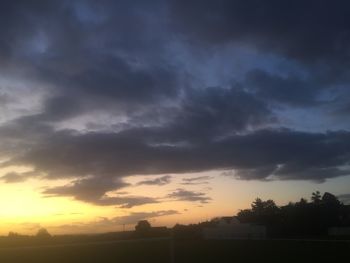 Scenic view of silhouette landscape against sky during sunset