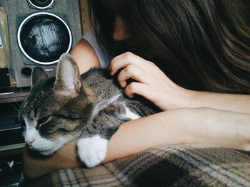 Cat sleeping on bed