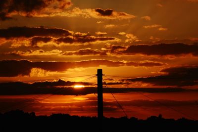 Scenic view of dramatic sky during sunset