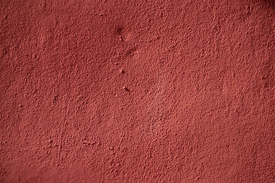 Red texture on the wall of a house. pelourinho, salvador, bahia, brazil.