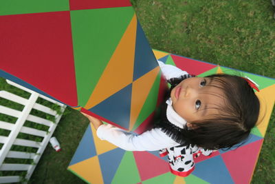 High angle view portrait of cute girl