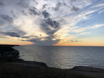 Scenic view of sea against sky during sunset