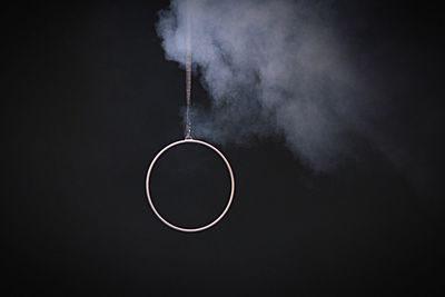 Close-up of electric lamp against black background