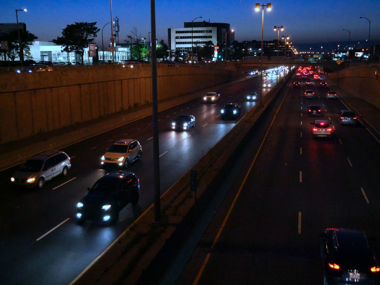 TRAFFIC ON CITY STREET AT NIGHT