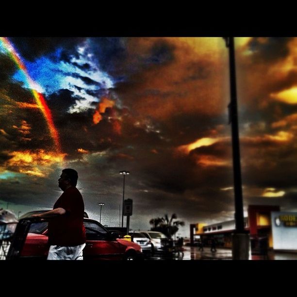 sky, cloud - sky, silhouette, transportation, mode of transport, sunset, cloudy, men, land vehicle, cloud, lifestyles, dusk, dramatic sky, leisure activity, weather, car, illuminated, rear view