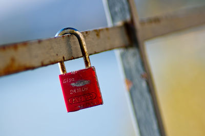 Close-up of red padlock