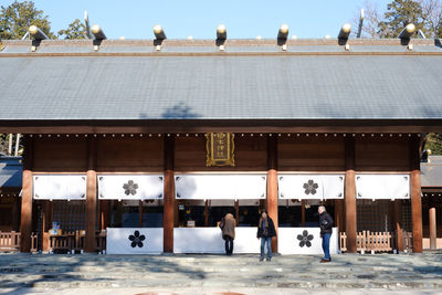 Group of people in front of building