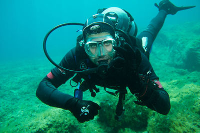 Man swimming in sea