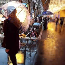 People on bicycle in city