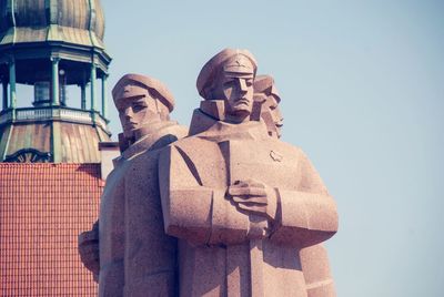 Low angle view of statue against sky