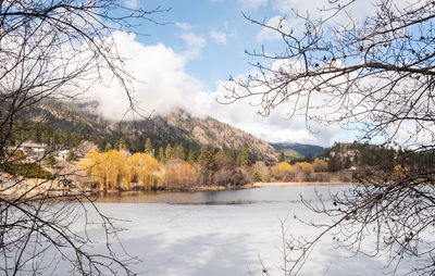 Scenic view of lake against sky during autumn