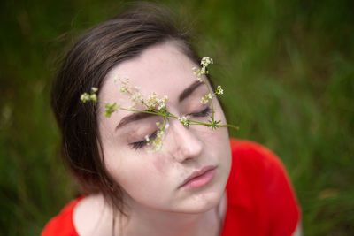 Close-up of woman with eyes closed