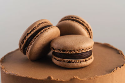 Close-up of macaroons on white background