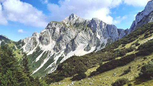 Scenic view of snowcapped mountains against sky