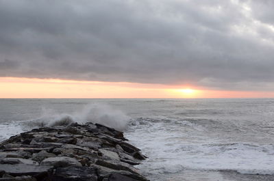 Scenic view of sea against sky during sunset