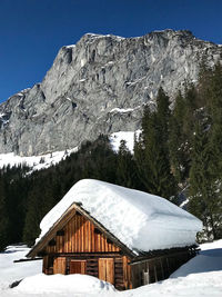 Snow covered mountain against sky
