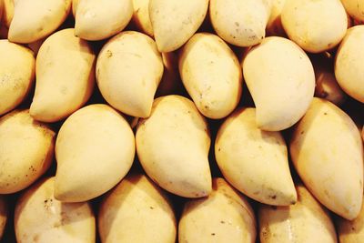 Full frame shot of mangoes in market for sale