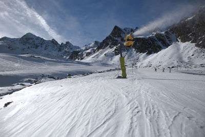 Snow covered mountain against sky