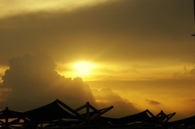Low angle view of cloudy sky at sunset