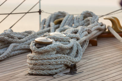 Close-up of rope tied on pier