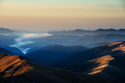 Scenic view of mountains during sunset