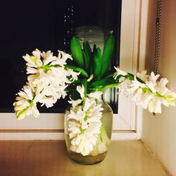 Close-up of flowers in vase on table