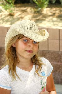 Portrait of girl wearing hat