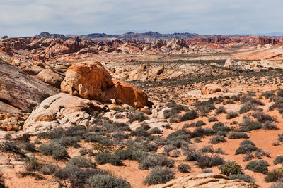 Rock formations on landscape against sky