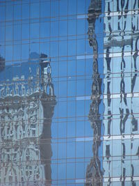 Low angle view of built structure against blue sky