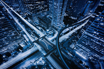 High angle view of illuminated cityscape at night