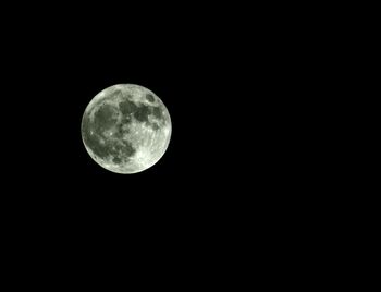 Low angle view of full moon in sky