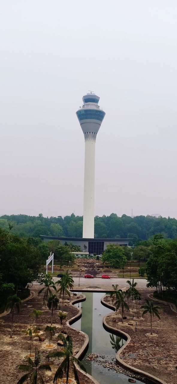 tree, architecture, tower, sky, plant, built structure, nature, building exterior, no people, day, travel destinations, travel, security, outdoors, land, water, scenics - nature, protection, tourism, beauty in nature, architectural column