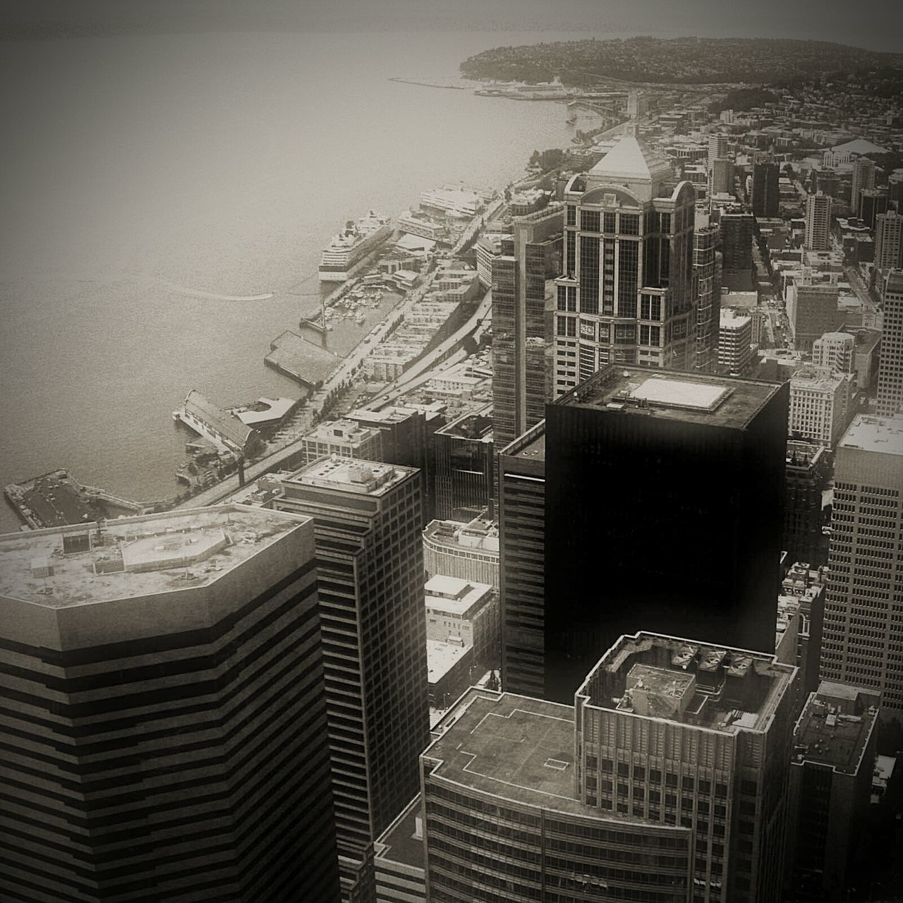 HIGH ANGLE VIEW OF MODERN BUILDINGS IN CITY