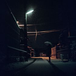 Illuminated street lights at night