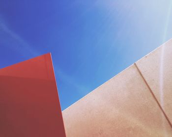 Low angle view of building against blue sky