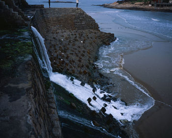 High angle view of sea shore during winter