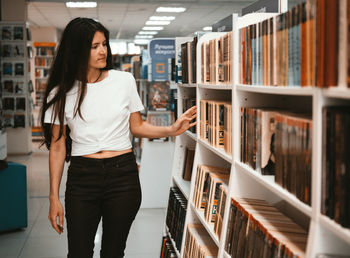 Young woman reading book