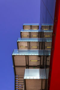 Low angle view of building against clear blue sky