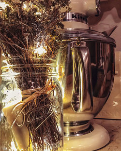 Close-up of glass jar on table at home