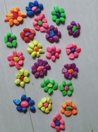 High angle view of multi colored candies on table