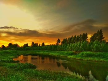 Scenic view of landscape at sunset