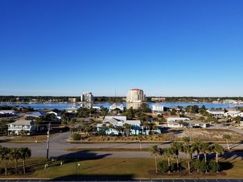 Scenic view of beach against clear blue sky
