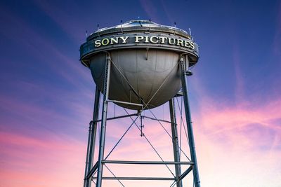 Low angle view of water tower against sky