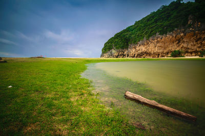 Scenic view of land against sky