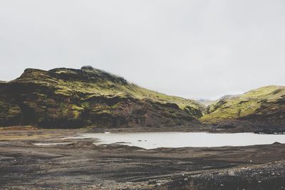Scenic view of mountain against clear sky