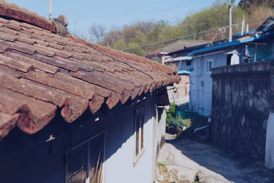 Houses against sky in city