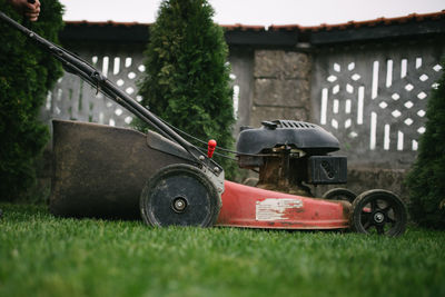 Vintage car on lawn outside house