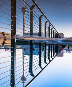 Pier over river against sky