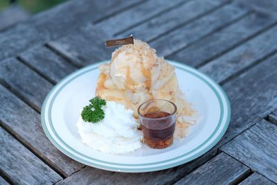 High angle view of ice cream in plate on table