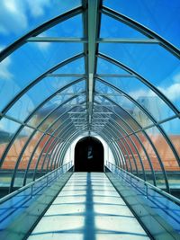 Low angle view of bridge against sky in city